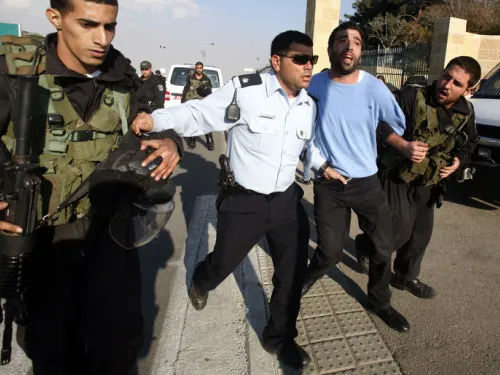 Israeli forces arrest a Palestinian at Hebrew University during a protest against Israel’s attack on Gaza, 20 November 2012