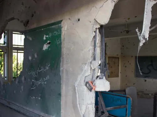 A classroom in Gaza destroyed in Israel’s 2014 attacks. Credit: Active Stills, Basel Yazouri