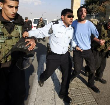 Israeli forces arrest a Palestinian at Hebrew University during a protest against Israel’s attack on Gaza, 20 November 2012